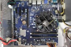 Bare motherboard view of SEGA Nu2 arcade PC with expansion cards removed
